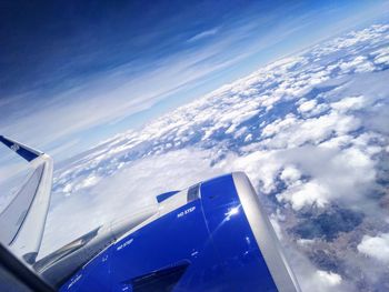 Aerial view of clouds over blue sky