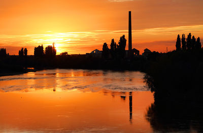 Silhouette of buildings at sunset