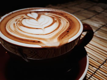 Close-up of cappuccino on table