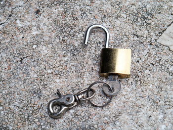 High angle view of padlock on chain