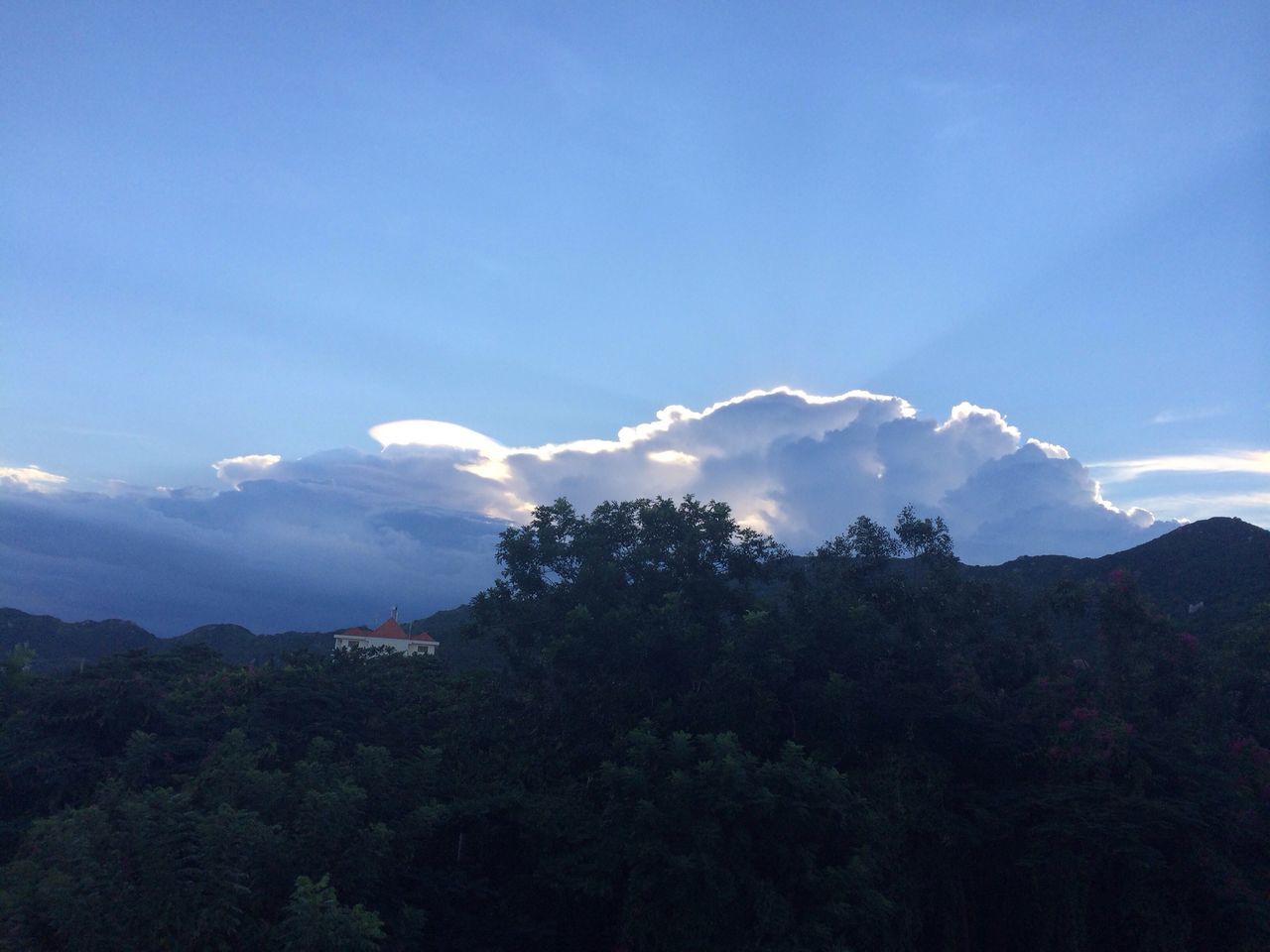 mountain, scenics, tranquil scene, tree, beauty in nature, tranquility, mountain range, sky, landscape, blue, nature, idyllic, cloud - sky, silhouette, copy space, non-urban scene, outdoors, cloud, no people, day