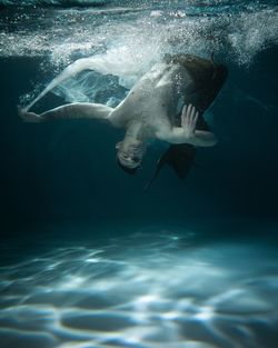 Woman swimming in sea