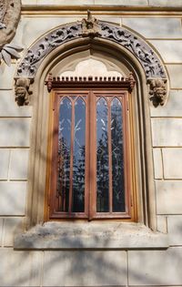 Low angle view of closed door of building