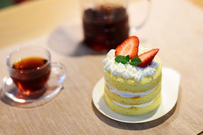 Close-up of cake served on table