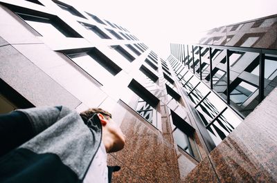 Woman standing in front of building