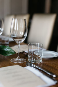Empty glasses on table at restaurant