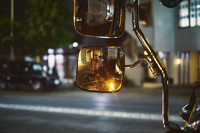 Close-up of illuminated car on street