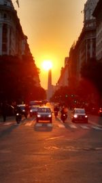 Sun shining through city street