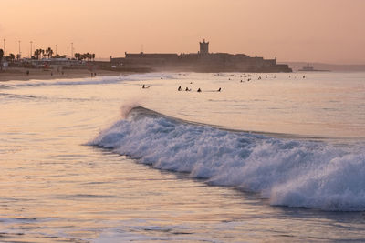 Scenic view of beach during sunset