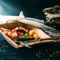 High angle view of fruits on cutting board