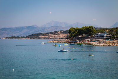 Sailboat on sea against sky