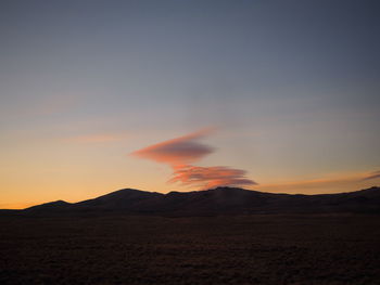 Scenic view of landscape against sky during sunset