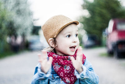 Portrait of cute girl wearing hat