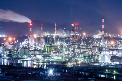 Illuminated buildings in city at night