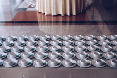 Empty coffee cup for wedding banquet conference seminar catering event. tea coffee break service