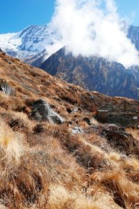 Scenic view of mountains against sky during winter