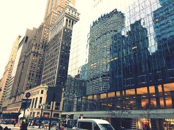 Low angle view of skyscrapers in city