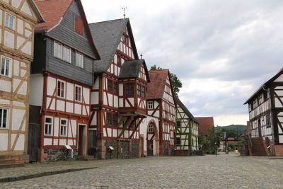 Houses against sky in city