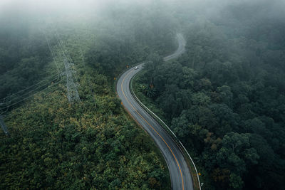 High angle view of mountain road in forest