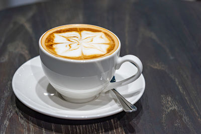 Coffee cup on table