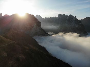 Scenic view of mountains against sky during sunset