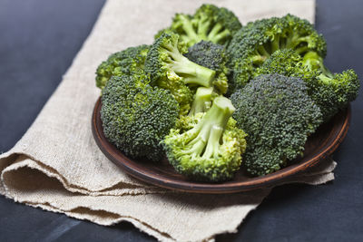 Close-up of broccoli in plate on table