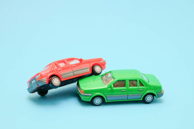 High angle view of toy car on blue background