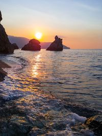 Scenic view of sea against sky during sunset