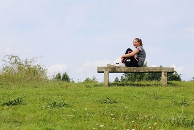 Man sitting on field