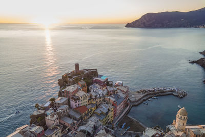 High angle view of sea against sky during sunset