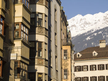 Low angle view of buildings in city against sky