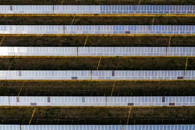 Close-up of modules of a photovoltaic system on a solar park in germany from a drone perspective
