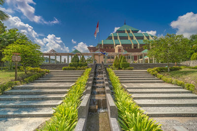 View of building against cloudy sky