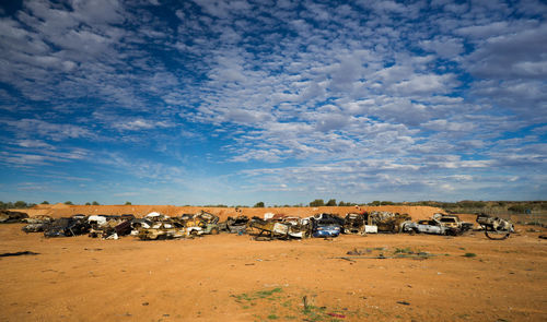 Panoramic view of landscape against blue sky