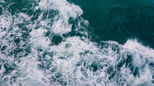 High angle view of water splashing in sea