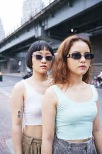 Portrait of young woman wearing sunglasses