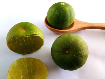 Close-up of fruits against white background