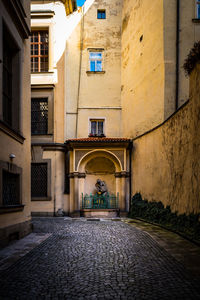 Man in front of building