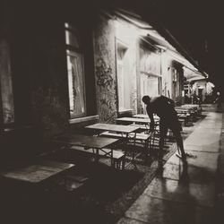 Man on corridor of building