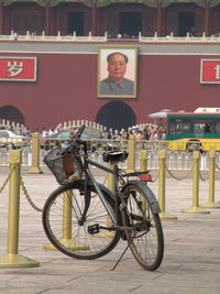 Man with bicycle in city