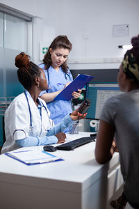 Female doctor working at clinic