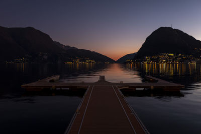 Scenic view of pier against clear sky during sunset