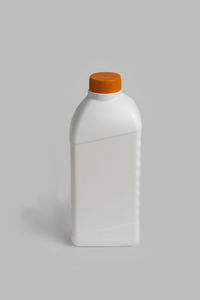 Close-up of bottle against white background