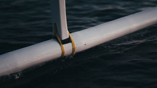 High angle view of railing against sea