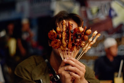 Close-up of hand holding food