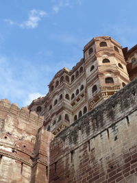 Low angle view of old building against sky