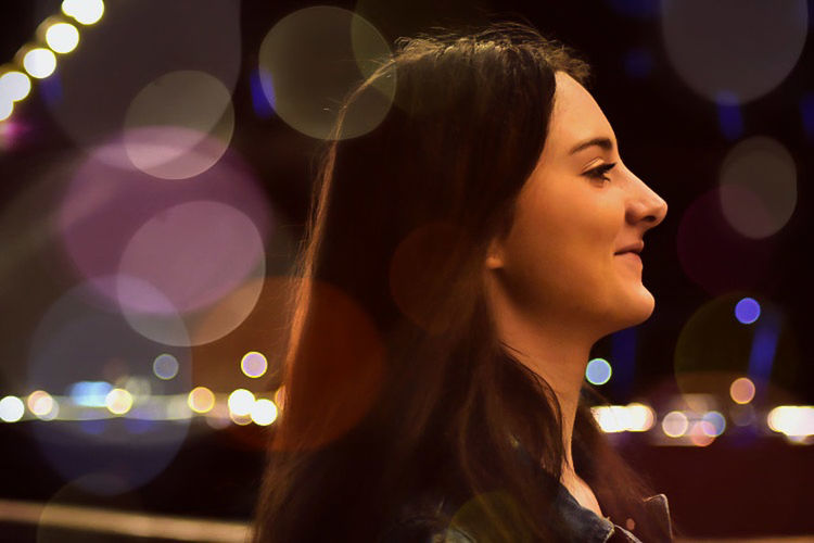 night, young adult, illuminated, headshot, one person, young women, hairstyle, long hair, portrait, hair, nightlife, beauty, adult, beautiful woman, lens flare, looking, women, city, focus on foreground, profile view, contemplation