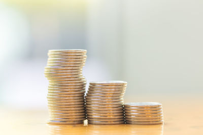 Close-up of coins on table