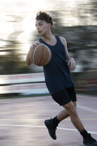 Portrait of teenager basketball player