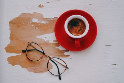 High angle view of coffee cup on table